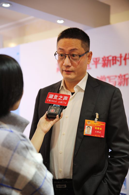 王辉光委员建议"加强立法做好保护古树名木工作".